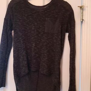 Olive color shirt with front pocket. Scoop neck and knot material